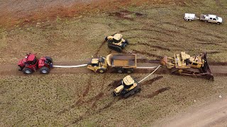 Big D11 Bulldozer Drags Tractors and Dump Truck [upl. by Enybor464]