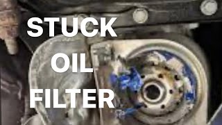 How To Remove A Stuck Mangled Oil Filter [upl. by Bracci]