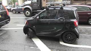 Shaquille ONeal seen driving a smart car around NYC [upl. by Ahsiram176]